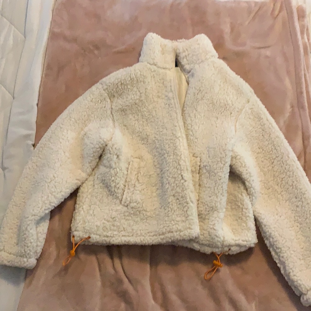white fluffy zip up size medium